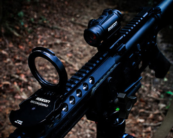 The rail mount Second Zero in front of Axeon Optics MDSR1 compact red dot sight.